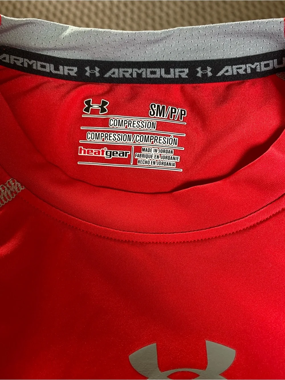 Under Armour Red Boys Swim Shirt.